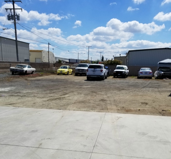 Many Cars in car lot for auto body shop